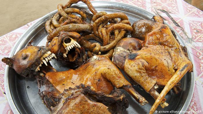 Meat Seller Exposed in Freetown After Using Dog Meat as Barbecue to Sell in The Street 