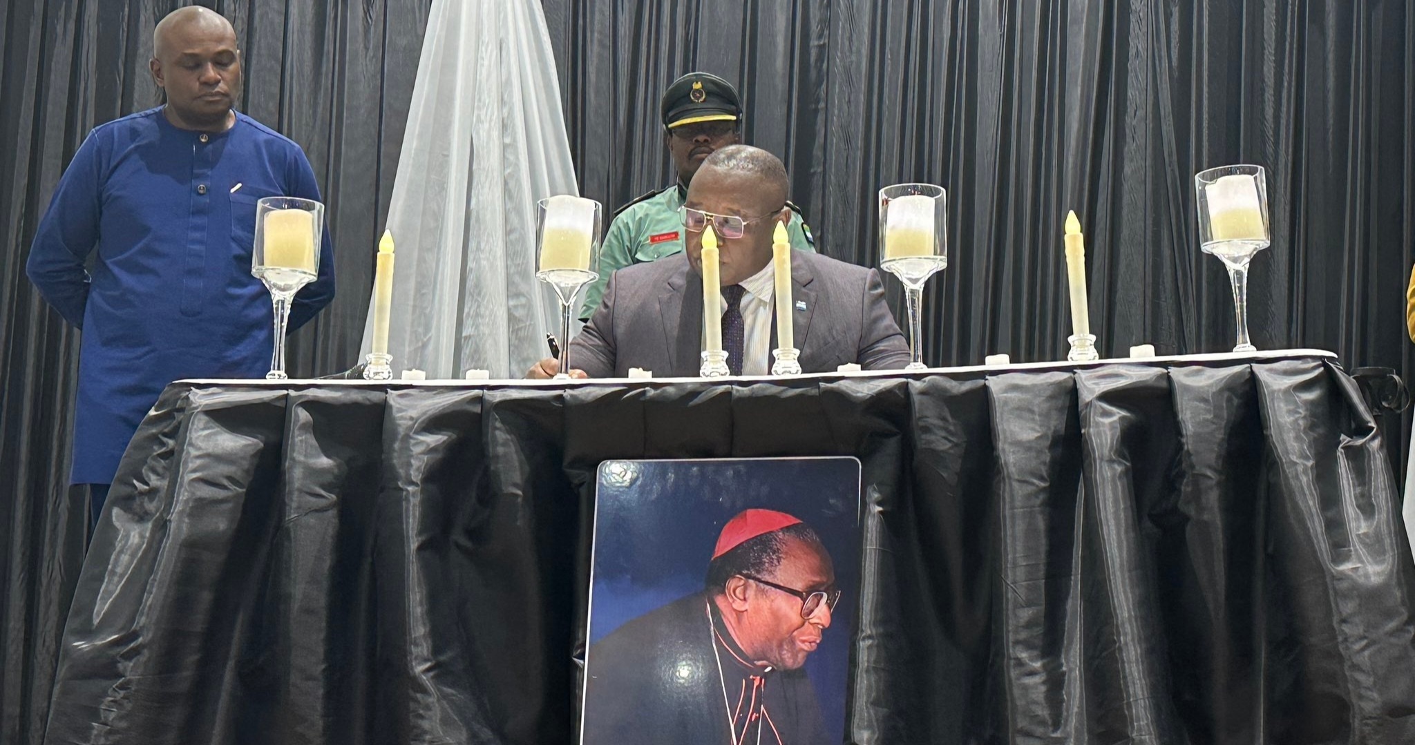 President Bio Signs Book of Condolence For Late Arch-Bishop Ganda