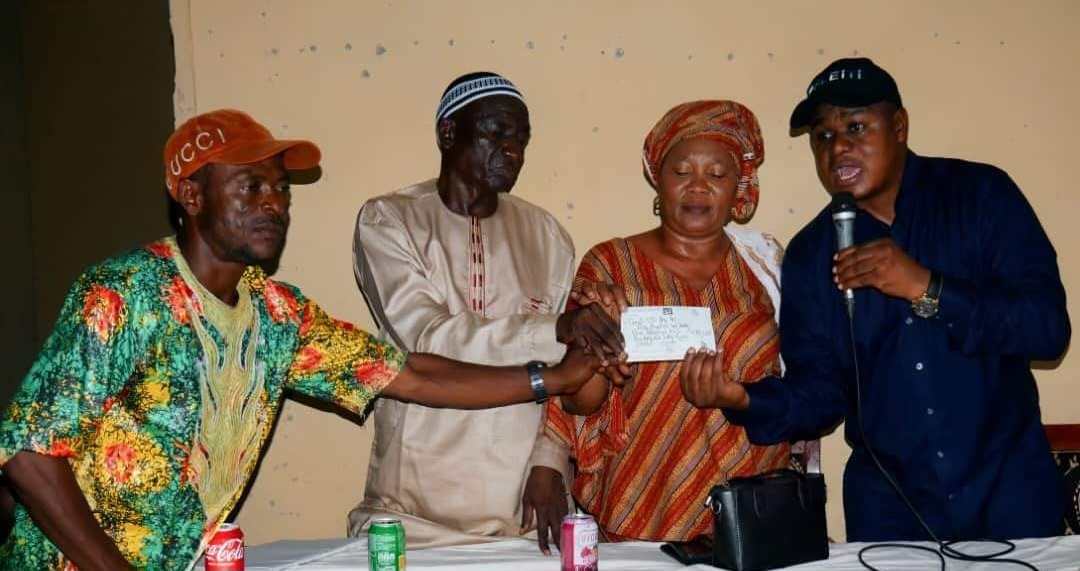 Hon Emerson Lamina Hands Over Cheque For Surface Rent to Gbense Primary Host Cluster