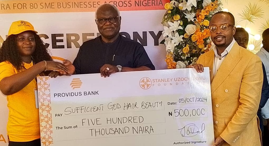 Former President Ernest Bai Koroma Hands Over Grant to 80 Nigerian Businesses