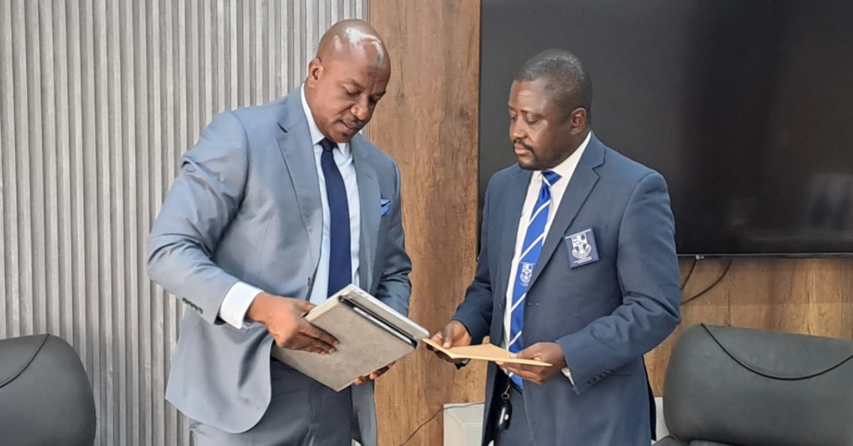 Former Attorney General Mohamed Lamin Tarawally Presents Handing-Over Report to New AG