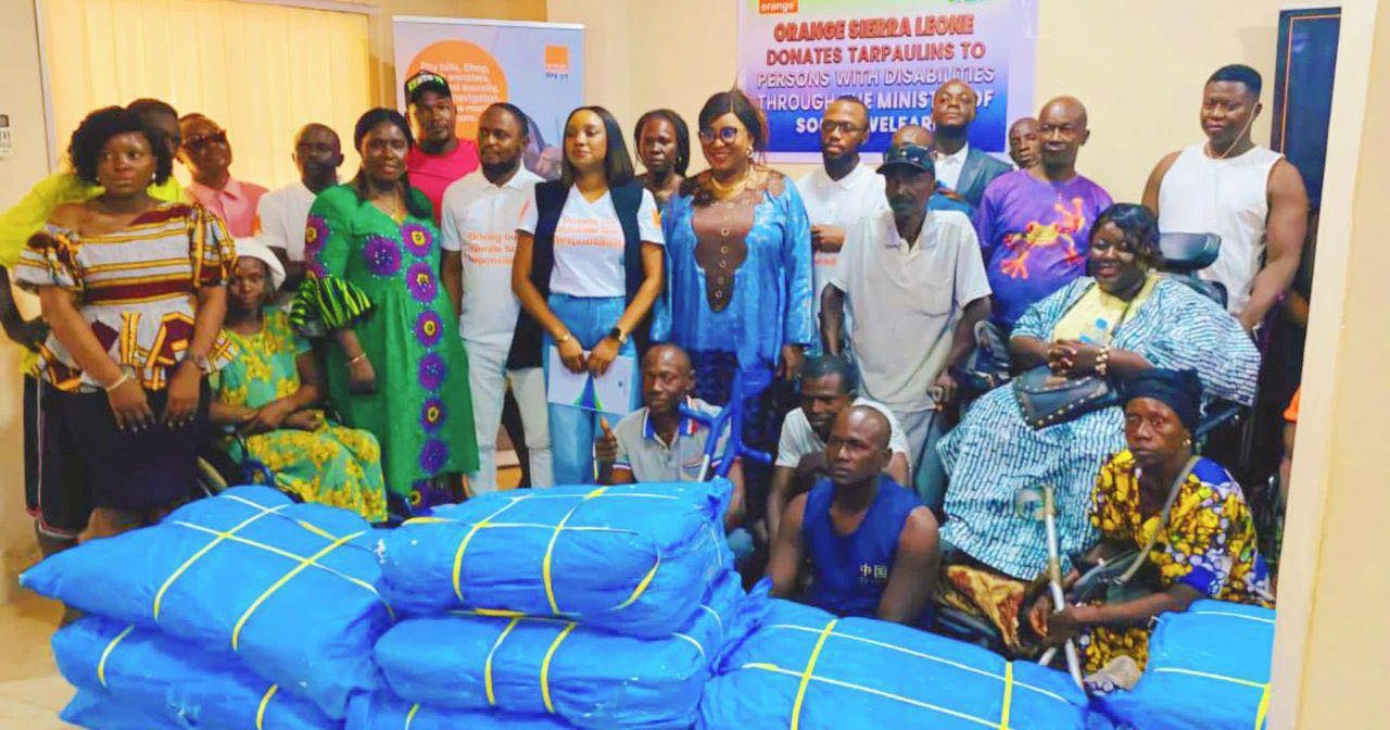 Orange Sierra Leone Supports Persons With Disabilities With Donation of 100 Tarpaulins